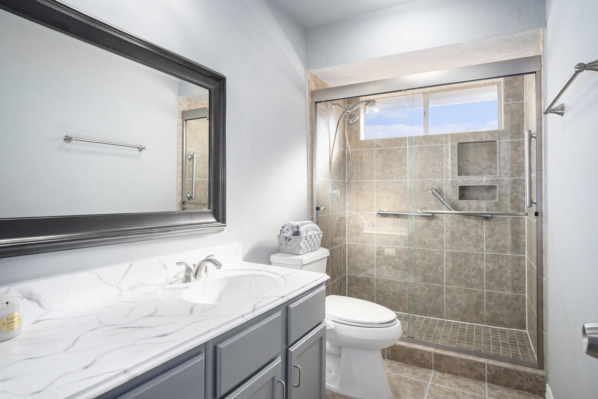 3315 Mourning Dove Drive Spring, TX 77388 - Photo 38 of 44 a bathroom with a granite countertop sink a toilet and a mirror