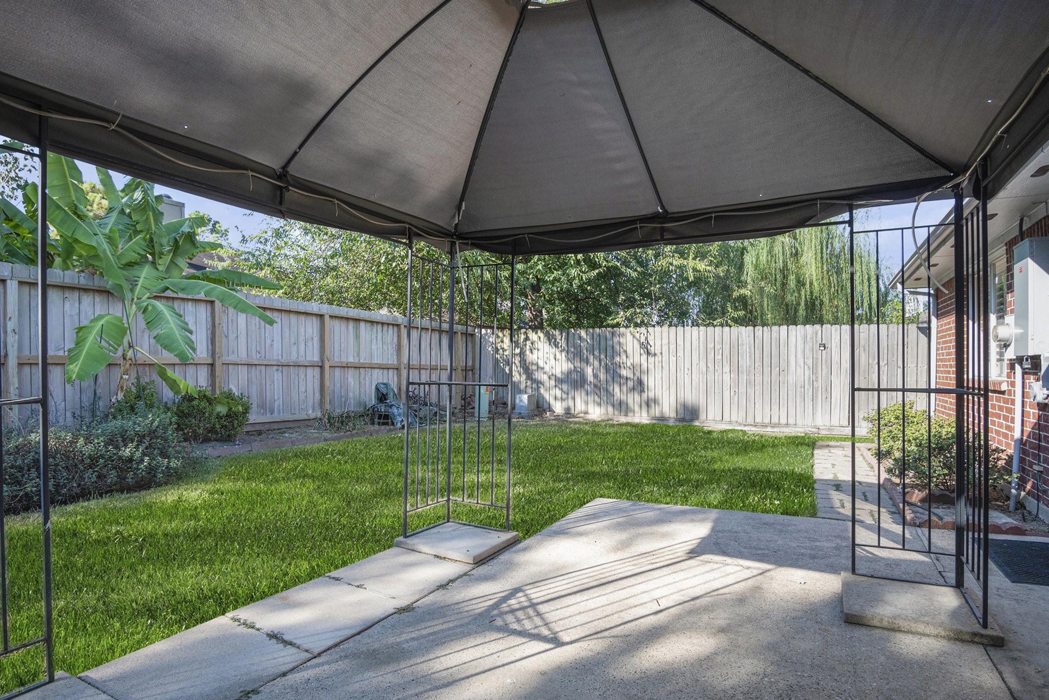 3315 Mourning Dove Drive Spring, TX 77388 - Photo 44 of 44 a wooden bench sitting in middle of a yard