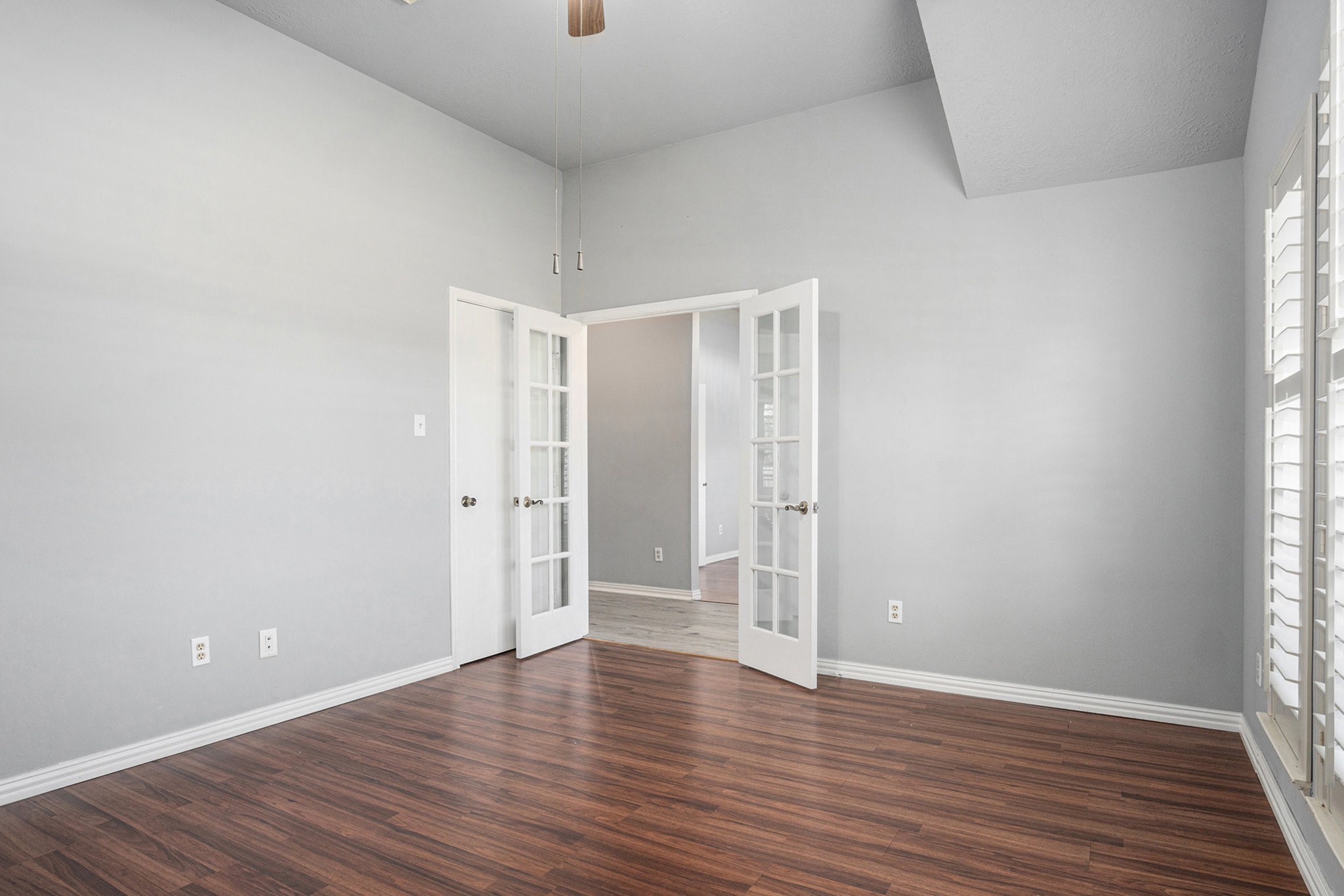 3315 Mourning Dove Drive Spring, TX 77388 - Photo 8 of 44 a view of an empty room with wooden floor and window