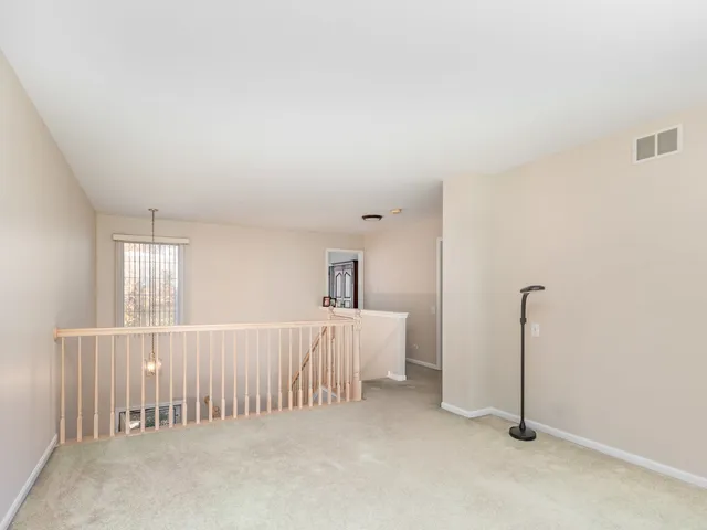 a view of a room with a window