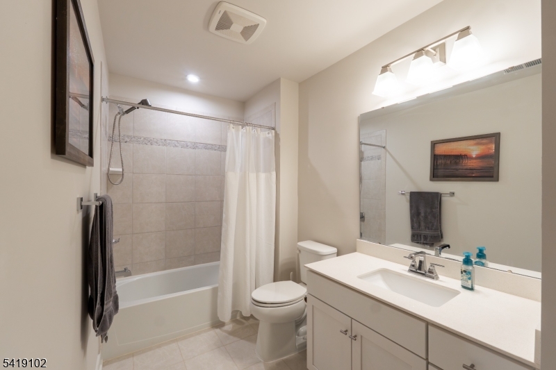 18 Sparrowhawk Street Washington, NJ 07882 - Photo 18 of 31 a bathroom with a sink a toilet and shower