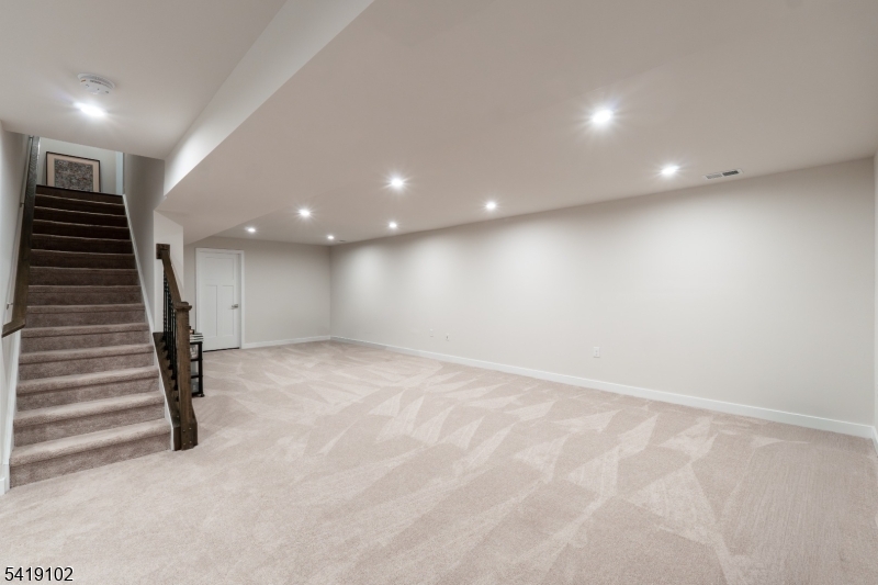 18 Sparrowhawk Street Washington, NJ 07882 - Photo 22 of 31 a view of an empty room with stairs