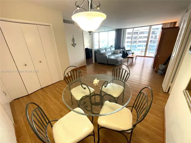 a view of balcony with outdoor seating and city view