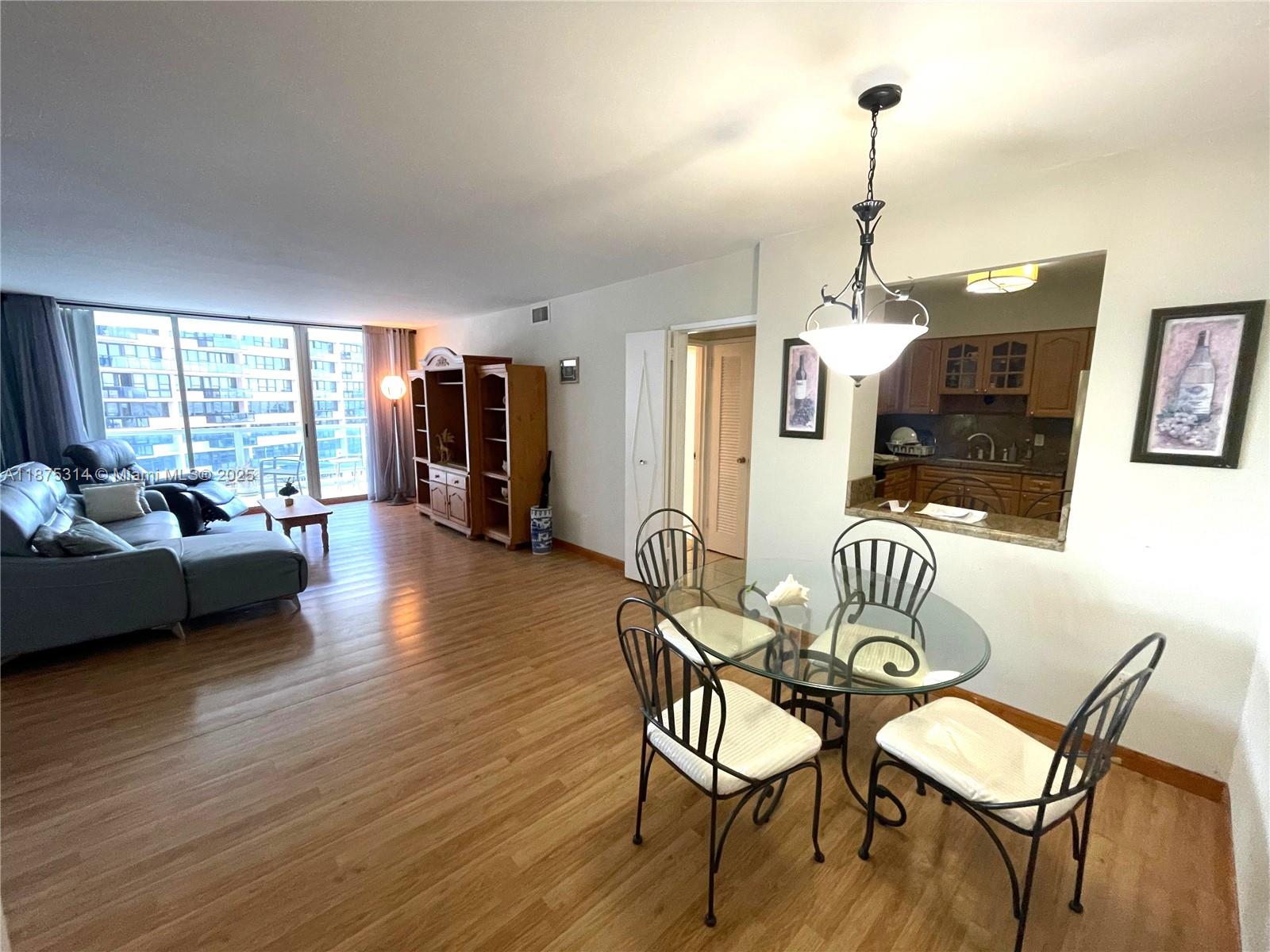 5161 Collins Avenue, Unit 603 Miami Beach, FL 33140 - Photo 6 of 56 a view of a livingroom with furniture and a window