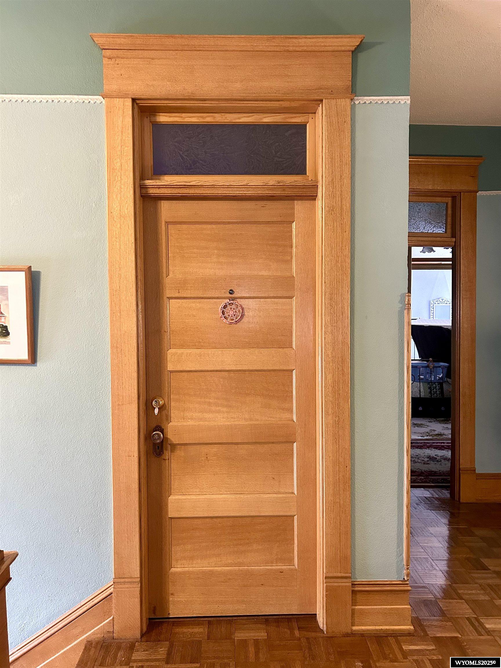 607 West Maple Street Rawlins, WY 82301 - Photo 29 of 47 Doors with transoms exude timeless elegance & architectural charm.