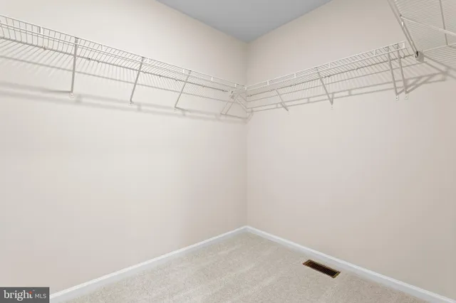 a view of a room with racks on the wall
