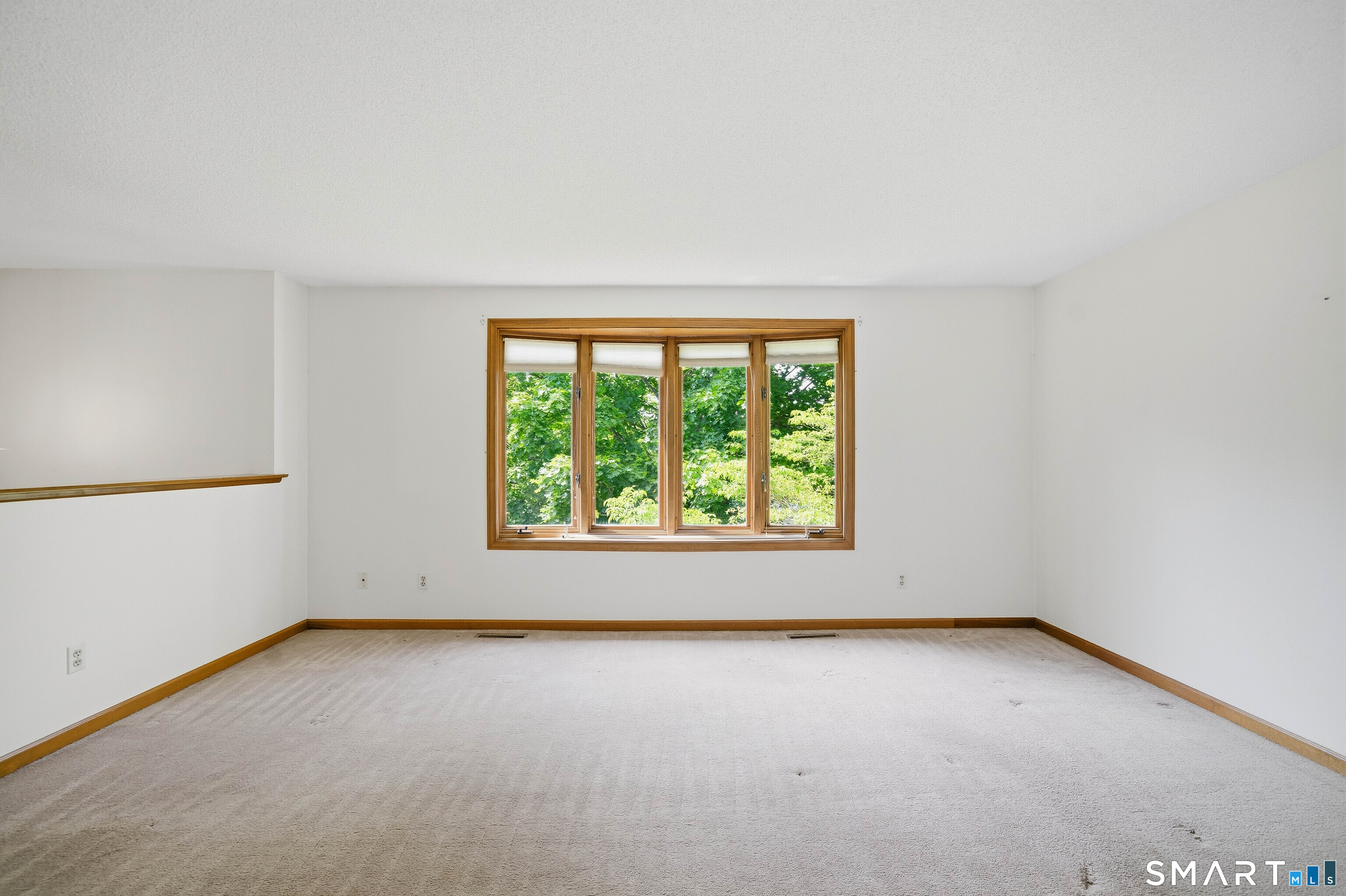 17 Spruceland Road Enfield, CT 06082 - Photo 16 of 40 Bow window in the living room for added sunlight