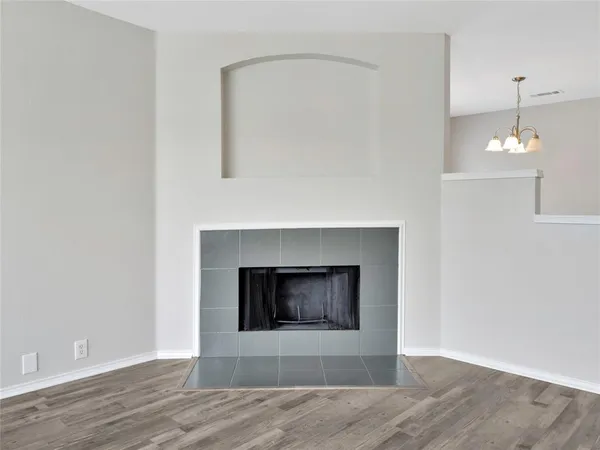 a room with a fireplace