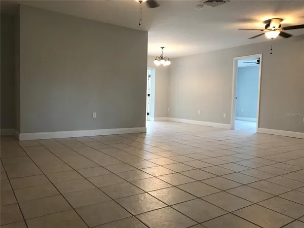 an empty room with a bathroom