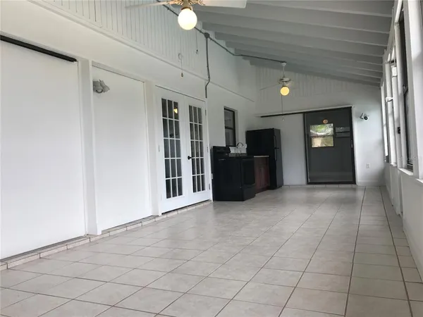 a view of an empty room and window
