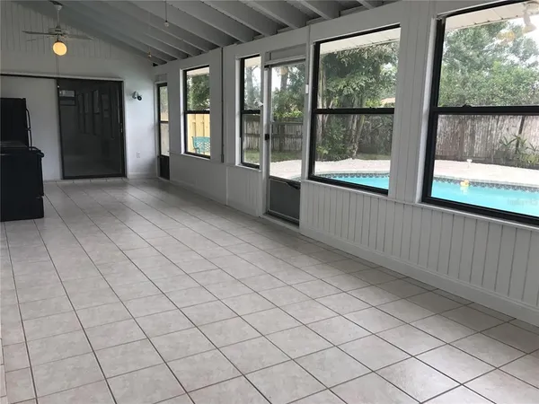 a view of an empty room and window