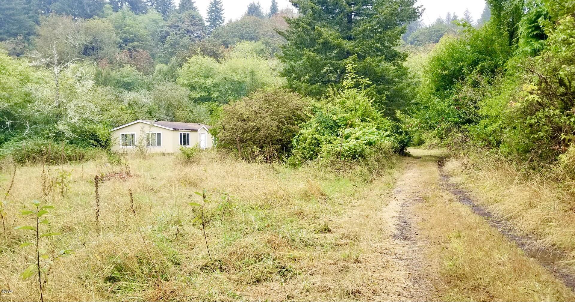 2745 North North Bank Road Otis, OR 97368 - Photo 1 of 1 Front