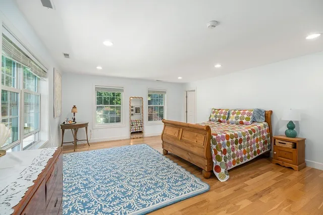 a bed room with a bed and a couch