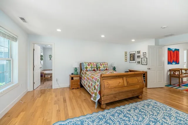 a bed room with a bed and a couch