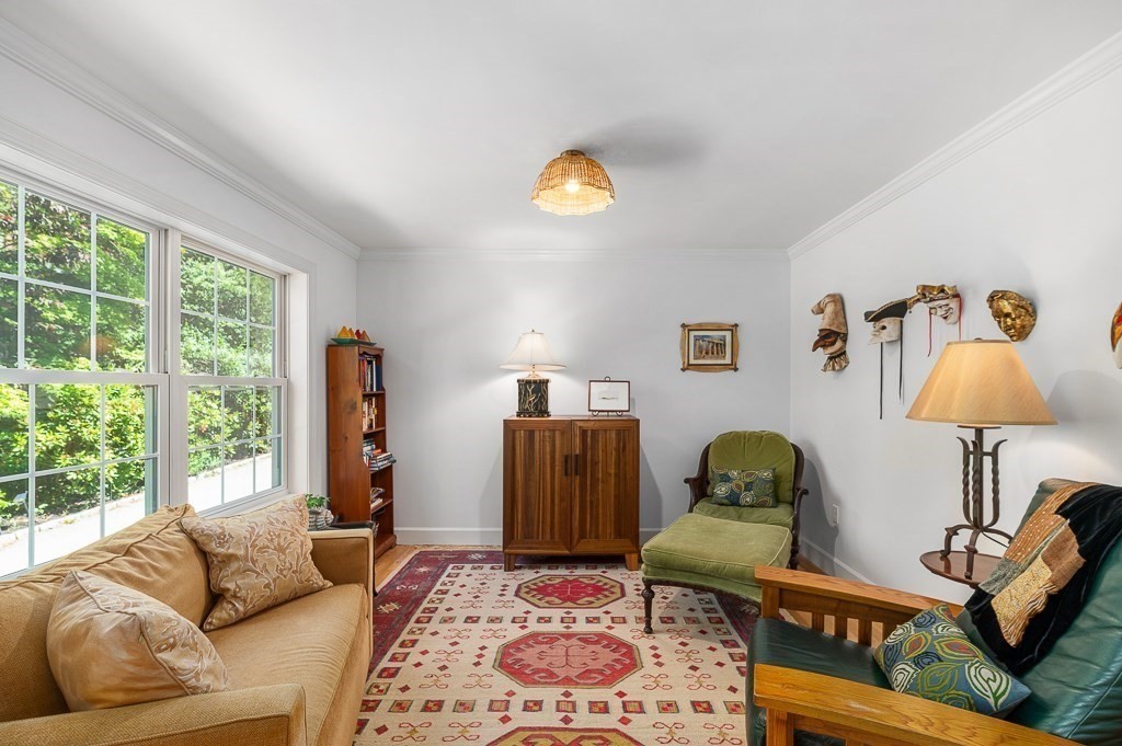 56 Summer Street, Unit A Manchester, MA 01944 - Photo 6 of 35 a living room with furniture and a window