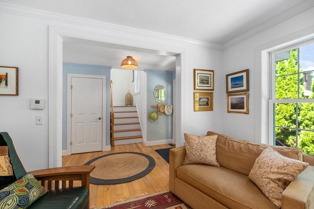 56 Summer Street, Unit A Manchester, MA 01944 - Photo 7 of 35 a living room with furniture and a window