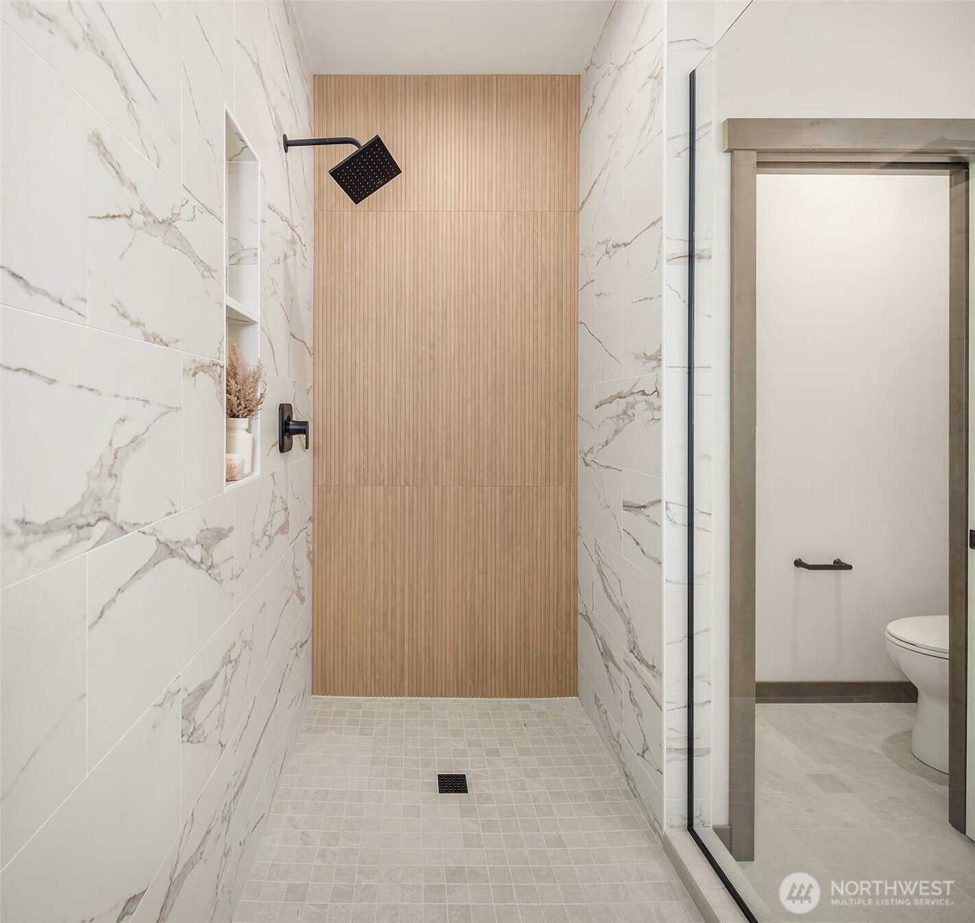 9207 Northeast 175th Street, Unit A Bothell, WA 98011 - Photo 22 of 38 a bathroom with a shower and a toilet