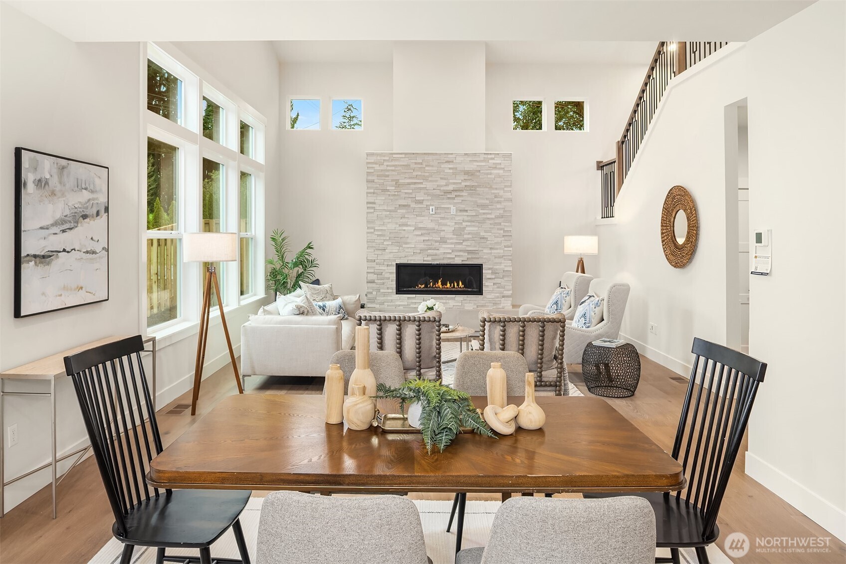 9207 Northeast 175th Street, Unit A Bothell, WA 98011 - Photo 7 of 38 a view of a dining room with furniture window and wooden floor