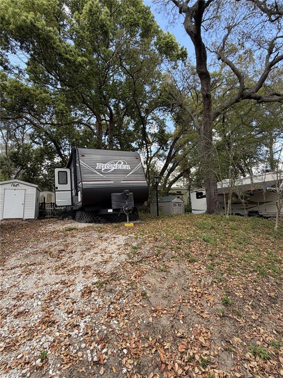3000 Clarcona Road, Unit 743 Apopka, FL 32703 - Photo 2 of 54 a house view with a garden space