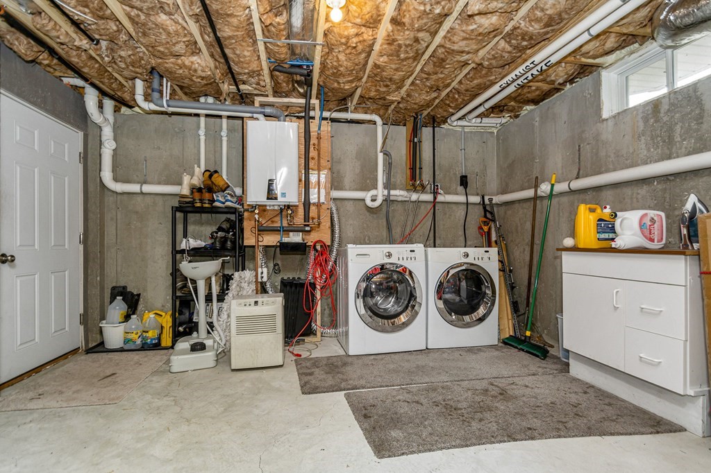 69 Riley Road, Unit 69 Tyngsboro, MA 01879 - Photo 27 of 42 a utility room with dryer and washer