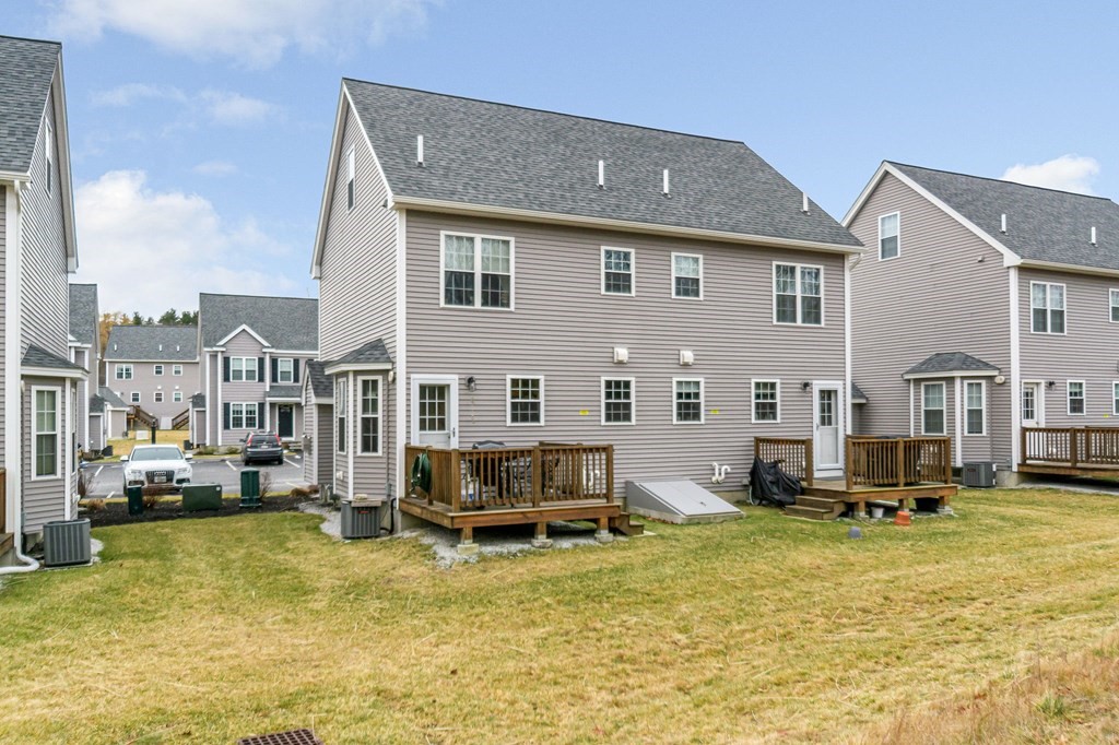 69 Riley Road, Unit 69 Tyngsboro, MA 01879 - Photo 33 of 42 a view of a house with swimming pool
