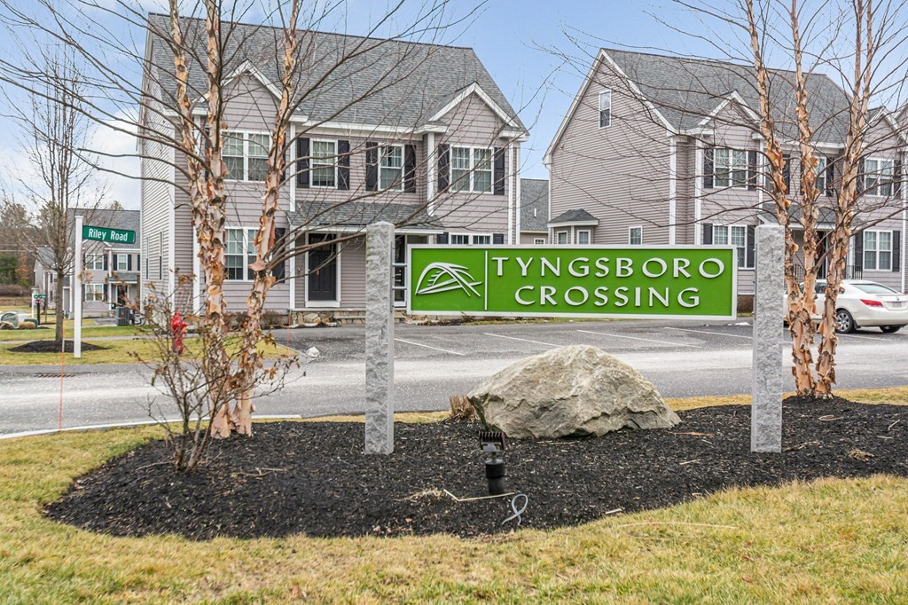 69 Riley Road, Unit 69 Tyngsboro, MA 01879 - Photo 36 of 42 a sign on the side of the building