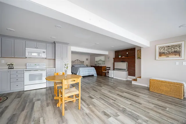 a bedroom with a large bed and a large window