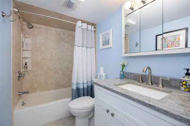 a backyard of a house with yard and outdoor seating