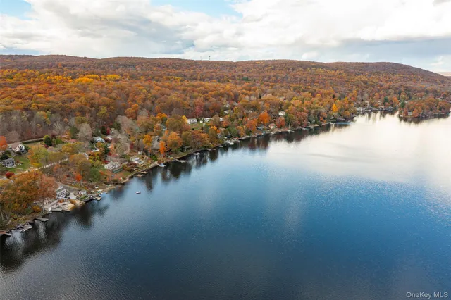 a front view of a house with umbrella