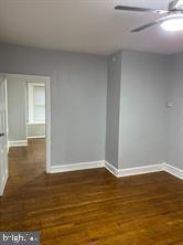 329 East Walnut Lane, Unit 2 Philadelphia, PA 19144 - Photo 5 of 8 a view of a room with wooden floor