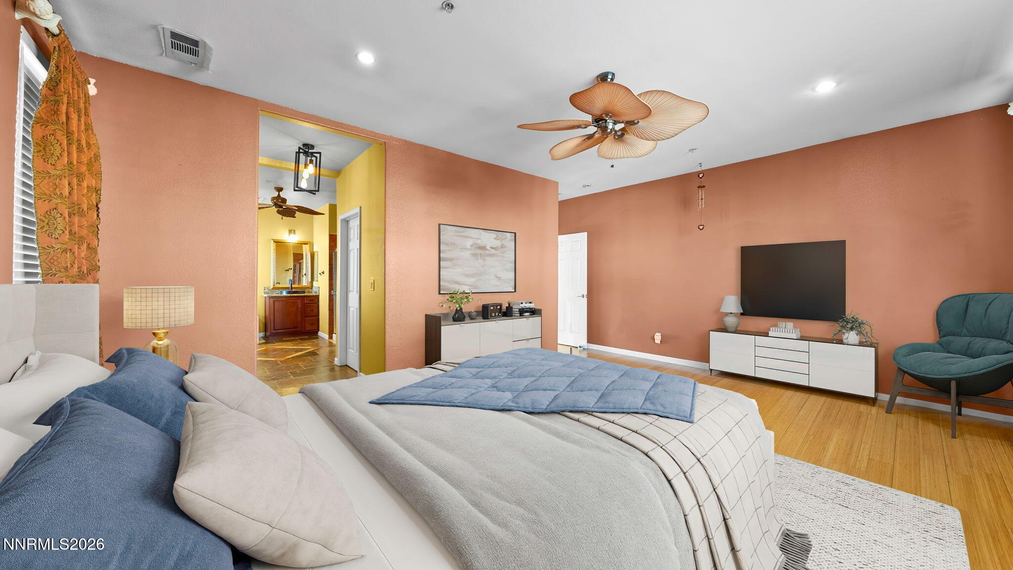 3250 Cityview Terrace Sparks, NV 89431 - Photo 18 of 62 a bedroom with a bed and a flat screen television