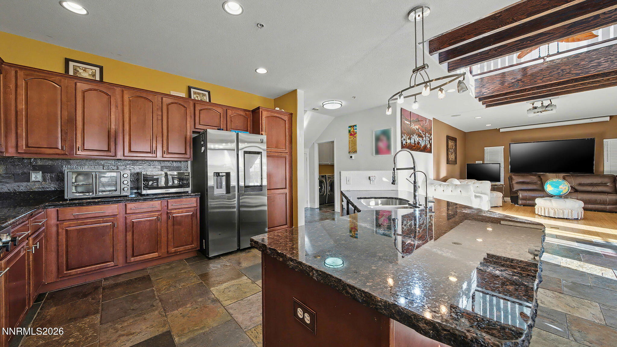 3250 Cityview Terrace Sparks, NV 89431 - Photo 6 of 62 a kitchen with stainless steel appliances granite countertop a sink refrigerator and cabinets