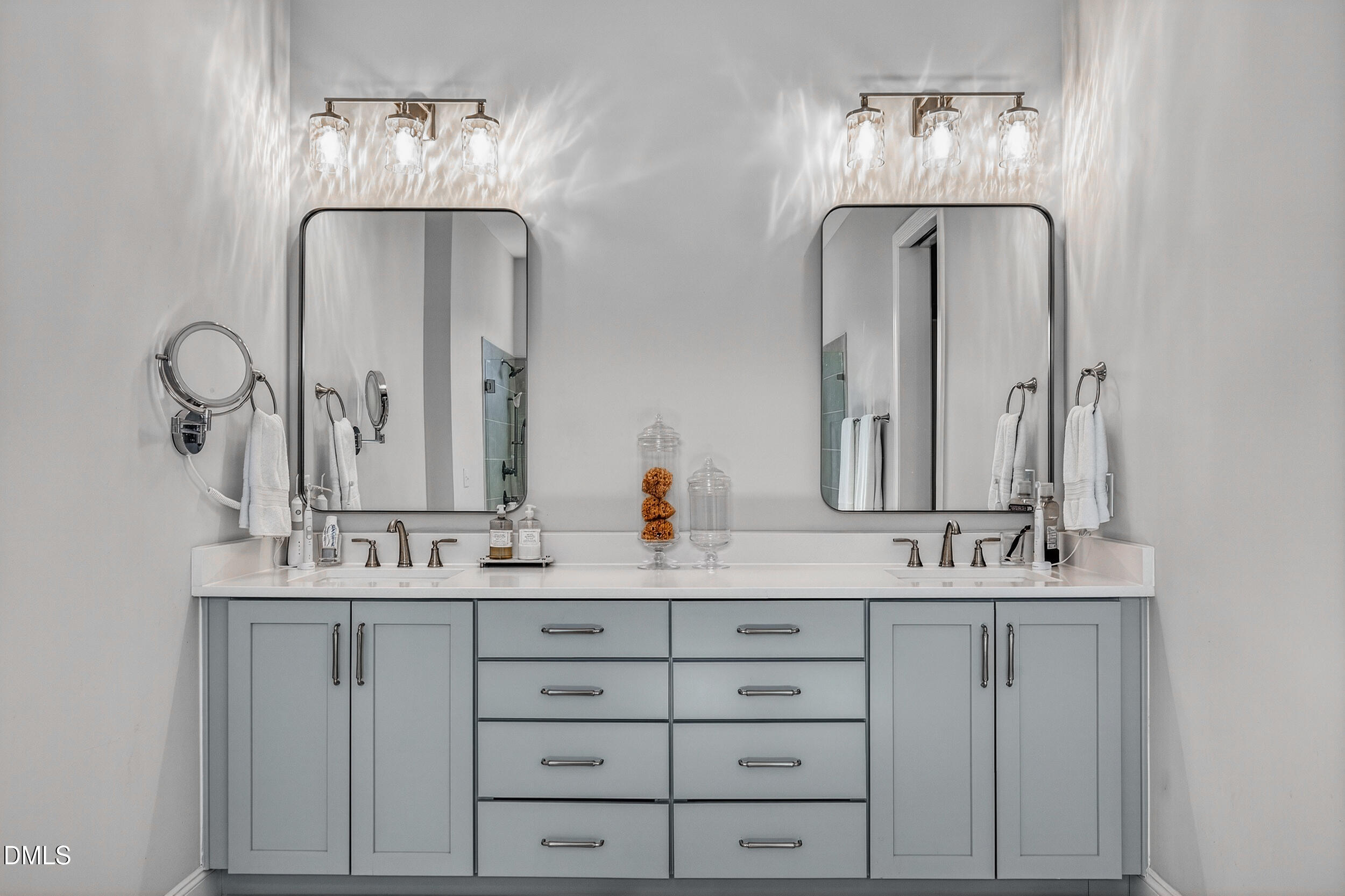 210 Lookout Ridge Pittsboro, NC 27312 - Photo 32 of 59 a bathroom with double vanity sinks and a mirror