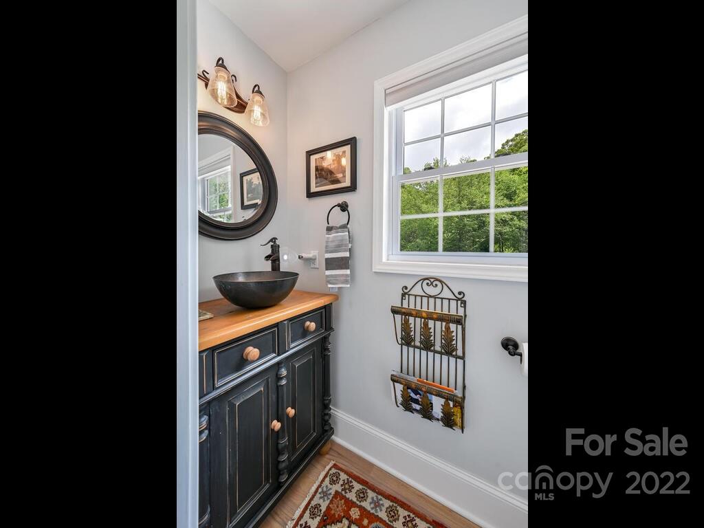 15 Raccoon Point, Unit 7 Canton, NC 28716 - Photo 13 of 39 a kitchen with stainless steel appliances granite countertop a stove and a window