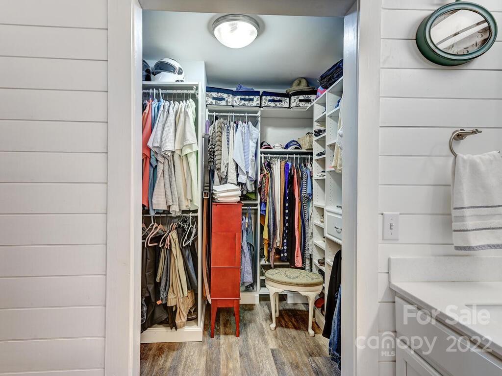 15 Raccoon Point, Unit 7 Canton, NC 28716 - Photo 20 of 39 a view of walk in closet with clothes and shoes