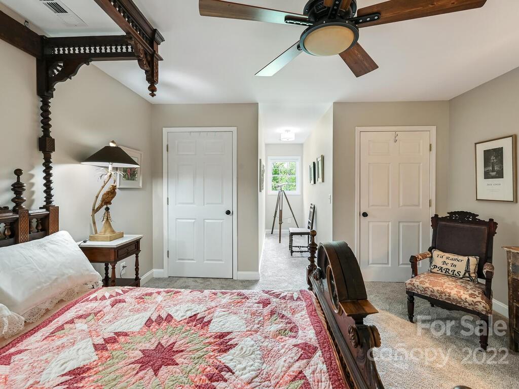 15 Raccoon Point, Unit 7 Canton, NC 28716 - Photo 24 of 39 a bedroom with furniture and a bed