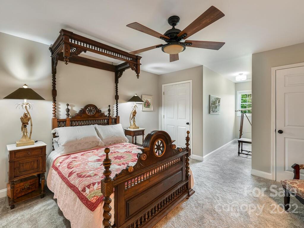 15 Raccoon Point, Unit 7 Canton, NC 28716 - Photo 25 of 39 a bed room with a bed and a ceiling fan