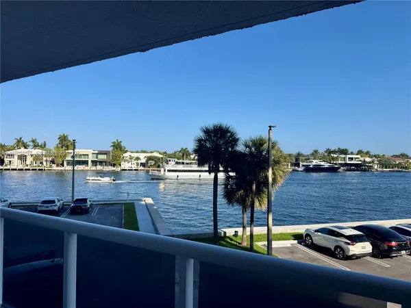 a view of a balcony with chairs