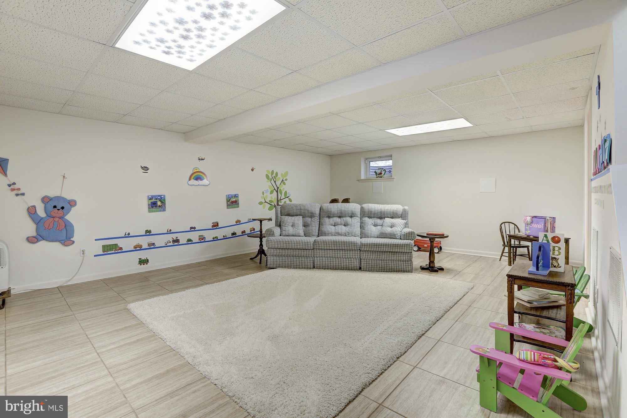 4413 Rendale Court Olney, MD 20832 - Photo 40 of 62 Rec room, or children's play area, tile floor