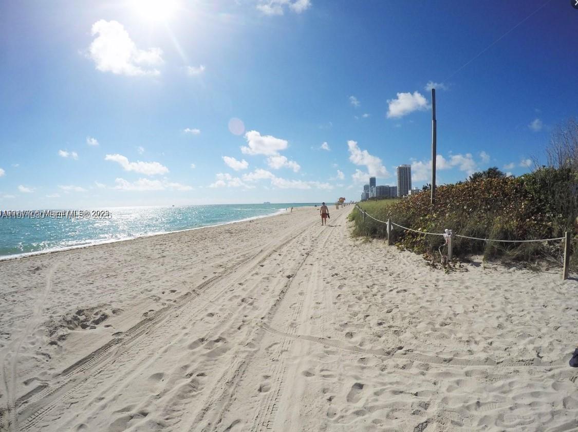 540 74th Street, Unit 10 Miami Beach, FL 33141 - Photo 15 of 27 a view of a beach