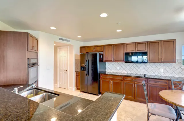 a view of a hallway with shelves
