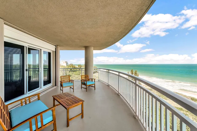 a front view of building with yard