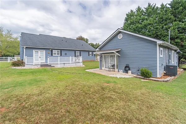 a kitchen with stainless steel appliances a refrigerator and a stove top oven