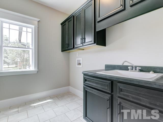 9814 Chris Drive Raleigh, NC 27603 - Photo 22 of 25 a view of a microwave oven