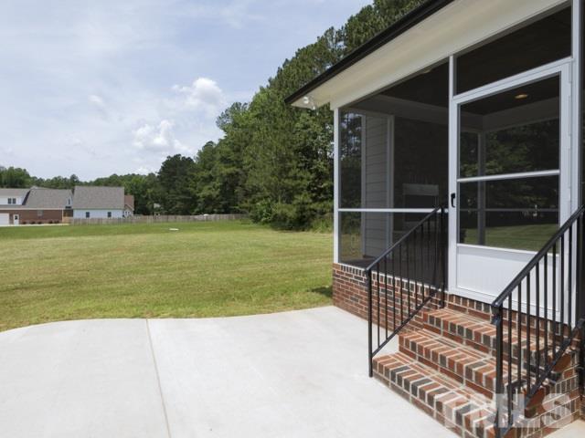 9814 Chris Drive Raleigh, NC 27603 - Photo 24 of 25 a view of a terrace