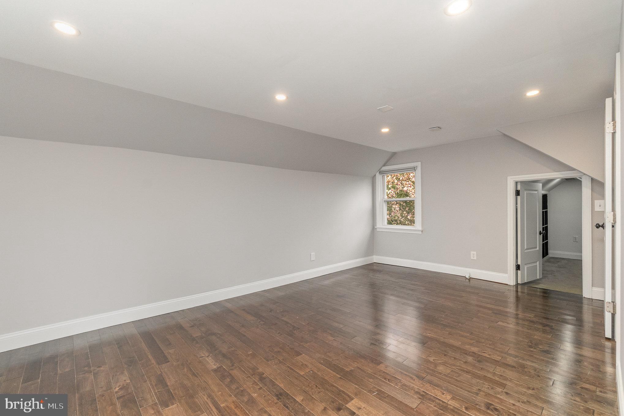 2834 Harford Road Fallston, MD 21047 - Photo 28 of 51 an empty room with wooden floor and windows