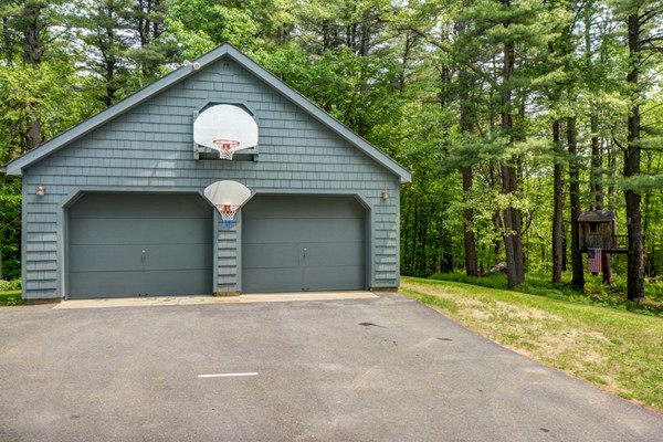 201 Davidson Road Boxborough, MA 01719 - Photo 3 of 30 a front view of a house with a garage