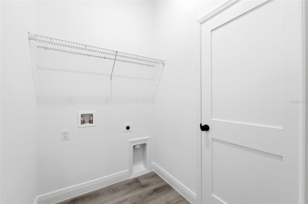 4510 Southwest 155th Street Ocala, FL 34473 - Photo 30 of 40 a view of a small space with wooden floor