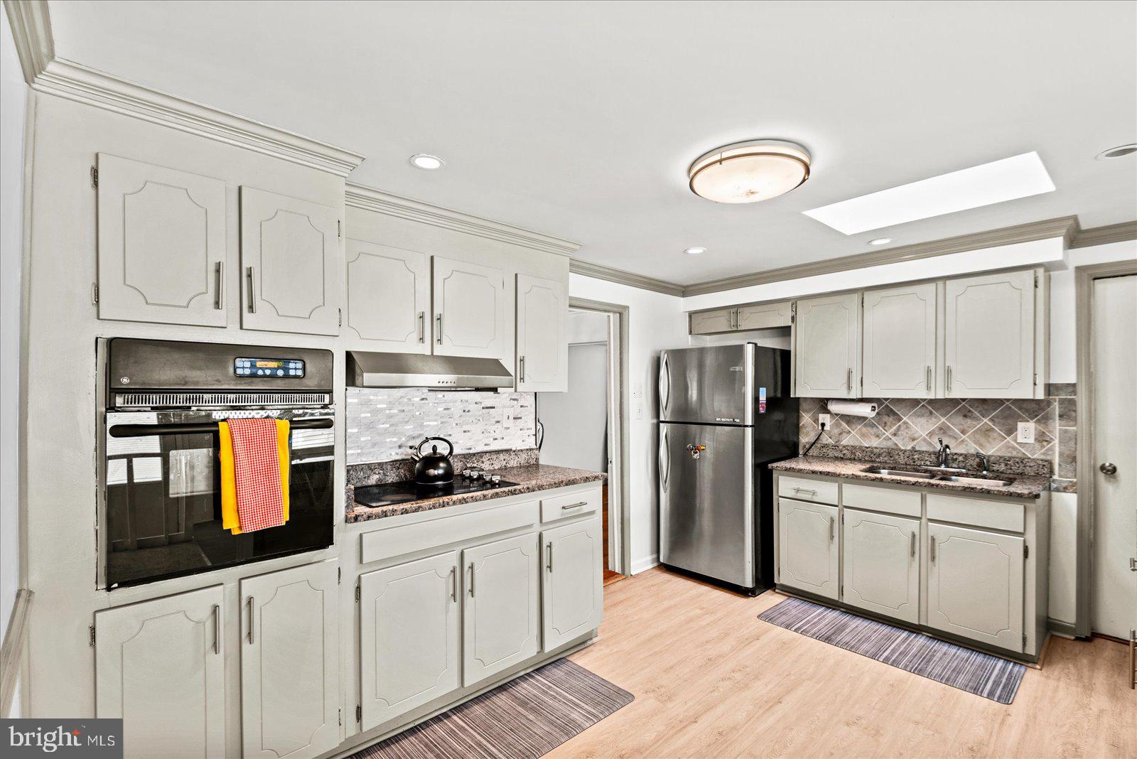 2931 Vawter Corner Road Louisa, VA 23093 - Photo 11 of 47 a kitchen with stainless steel appliances granite countertop a refrigerator and a stove top oven