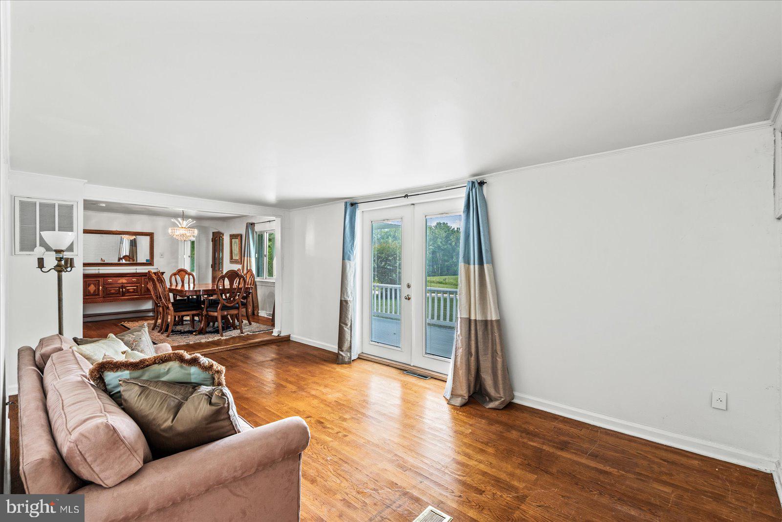 2931 Vawter Corner Road Louisa, VA 23093 - Photo 17 of 47 a living room with furniture and wooden floor